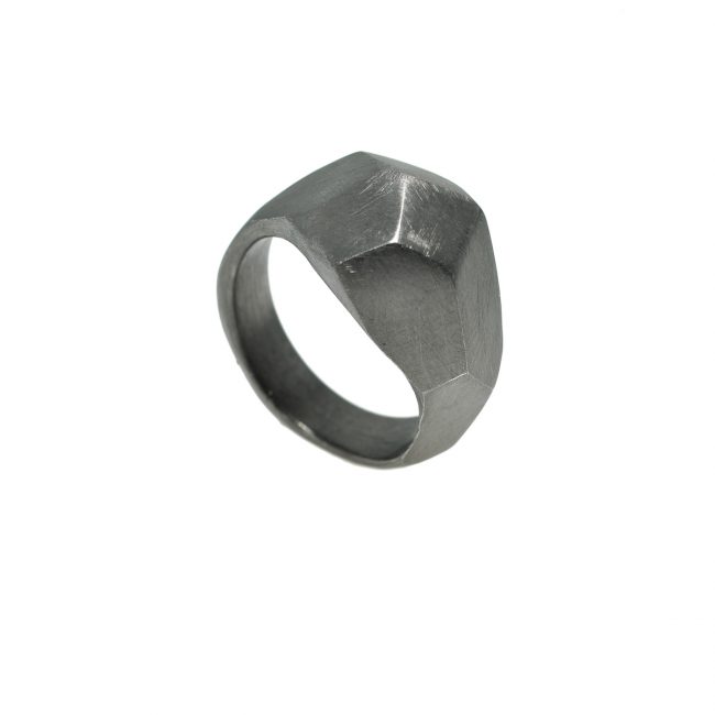 Large polygonal ring is part of the experimental collection. The polygonal ring was designed and made by Katerina Glinou. Material is silver rhodium plated.